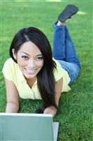 Asian Woman on Laptop Computer stock photo