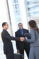 Diverse Business Team Shaking Hands stock photo