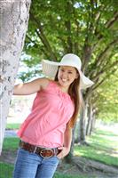Pretty Woman with Hat in Park stock photo
