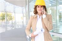 Pretty Construction Woman on Phone stock photo