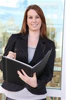 Pretty Business Woman at office stock photo