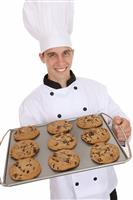 Handsome Man Chef with Cookies stock photo