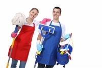 Attractive Cleaning Man and Woman stock photo