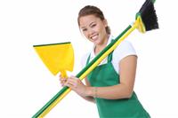 Cute Maid With Broom and Cleaning Supplies stock photo