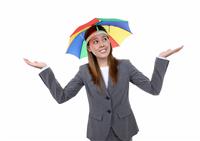 Business Woman Under Umbrella stock photo