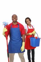Attractive Cleaning Man and Woman stock photo