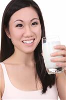 Asian Woman Drinking Milk stock photo