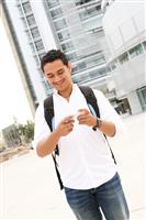 Male Student Texting at School stock photo