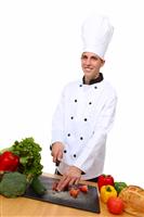 Handsome Chef Preparing Meal stock photo