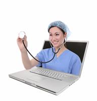 Woman Nurse and Latop Computer stock photo