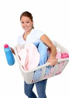 Pretty Woman Doing Laundry stock photo