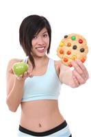 Woman on Diet Making Choice stock photo