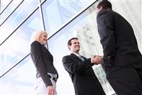 Diverse Business Team Shaking Hands stock photo