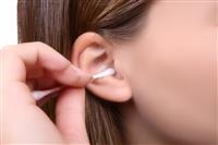 Woman Cleaning Ear stock photo