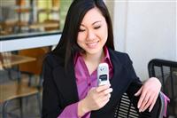 Asian Business Woman Texting With Phone stock photo