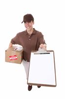 Delivery Man with Package stock photo