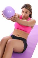 Woman Exercising on Mat stock photo