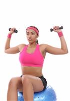 Woman Exercising with Weights stock photo