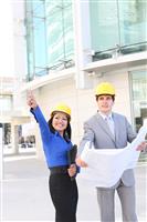 Architects on Building Construction Site stock photo
