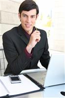 Handsome Business Man with Laptop stock photo