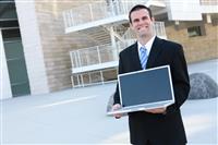 Handsome Business Man and Laptop stock photo