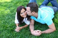Couple Kisssing in the Park stock photo