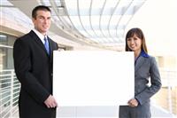 Business Team Holding Sign stock photo