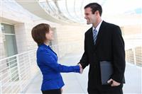 Business Man and Woman Handshake stock photo