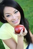 Pretty Girl Eating Apple stock photo