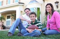 Happy Family at Home (Focus on Boy) stock photo