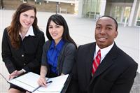 Diverse Business Team (Focus on Middle Woman) stock photo