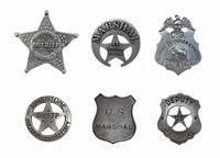 Assorted Police and Sheriff Badges stock photo