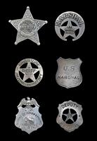 Several Police and Sheriff Badges stock photo
