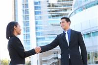 Business People Shaking Hands at Office stock photo