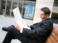 Business Man Reading Newspaper stock photo
