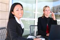Attractive Business Women At Office stock photo
