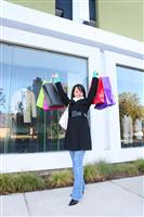 Pretty Woman Shopping with Colorful Bags stock photo