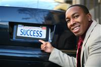 Business Man Success (Fictional License Plate) stock photo