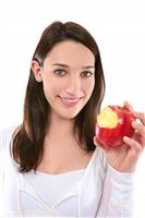 Woman Eating Apple stock photo