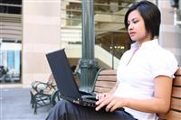 Pretty Woman Working on Laptop stock photo