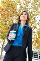 Business Woman Walking With Coffee stock photo