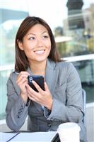 Pretty Asian Business Woman Texting stock photo