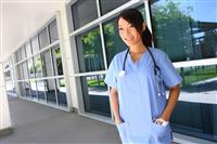 Asian nurse outside  hospital stock photo