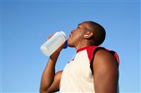 African Sports Man Drinking stock photo