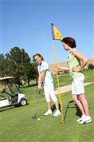 Pretty Women Golfing stock photo