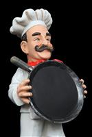 A man chef holding pan stock photo