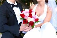 Bride and Groom with Wedding Flowers stock photo
