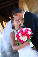 Bride and Groom Kissing at Wedding stock photo