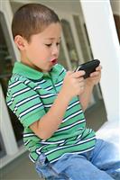 Boy Playing Video Game stock photo