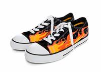 Flame Sneakers (Tennis Shoes) stock photo